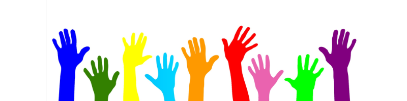 image of hands raised to volunteer